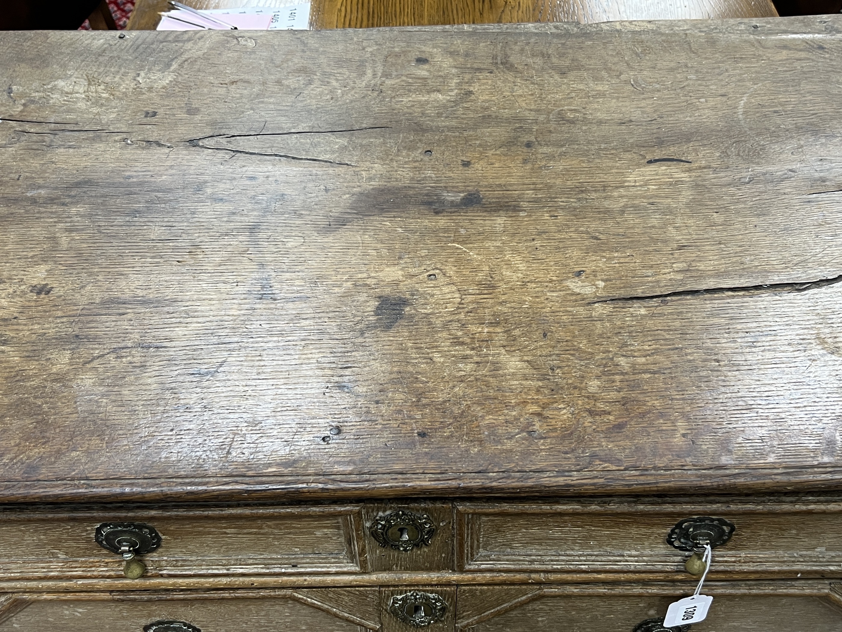 An 18th century geometric moulded oak chest of drawers, width 98cm, depth 57cm, height 92cm